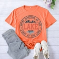 Close-up of orange t-shirt with Lake theme graphic print on white wooden background - S / Orange (Black Font)