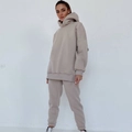 Damen Oversize-Hoodie und Jogginghose im Set, lässiger Sportanzug in Beige - S / Aprikose