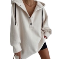 Close-up of white fuzzy fleece hoodie showing black drawstrings and button placket detail - S / White