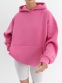 Close-up of pink oversized hoodie with dropped shoulders and a kangaroo pocket detail - Pink