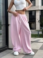 Dettaglio dei pantaloni larghi rosa chiaro in cotone morbido con coulisse regolabile - S / Rosa