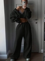 Detail view of black cropped zip hoodie and high-waist wide-leg lounge set in soft fleece - S / Black