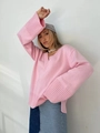 Dettaglio del maglione rosa in maglia con scollo a V e polsini a costine ampi - S / Rosa
