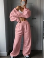 Detail of pink cropped hoodie and matching high-waisted sweatpants with zip closure - S / Pink