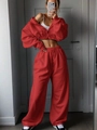 Detail of red two-piece tracksuit with cropped zip hoodie and high-waist wide-leg pants - S / Red
