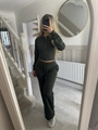 Detail of forest green zip-up hoodie and matching straight-leg trousers in soft knit - S / Dark Green