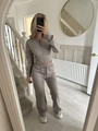 Detail of taupe knitted tracksuit set with zip-up hoodie and drawstring wide-leg pants - S / Khaki