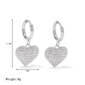 Elegant silver heart hoop earrings featuring sparkling rhinestones in a symmetric layout - Platinum