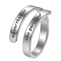 Detail of silver stainless steel ring featuring engraved nevertheless she persisted text - Nevertheless She Persisted / Steel