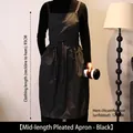 Lange plissierte wasserfeste Schürze in Schwarz mit Kordelzug und zwei Taschen - Mittellanger Stil / Schwarz