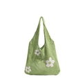 Grasgrüne hohle Stricktasche mit weißen Blumenmustern und praktischen Schultergurten - Grün