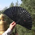 Chinese black silk folding fan with silver willow patterns and a black tassel detail - Style 39