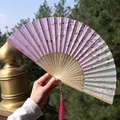 Classic Chinese folding fan in lavender with floral patterns and pink silk tassel - Purple-Grey Gradient Floral (Smiling Fan 50)