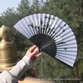 Classic Chinese folding fan featuring white ink floral silk and black frame with tassel - Black & White Ink Butterfly & Flower Style (Folding Fan 21)