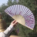 Classic Chinese folding fan with purple flower pattern, bamboo ribs and silk tassel - Elegant Purple Floral (Smile Fan 42)