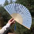 Chinese style folding fan in light blue with dark cherry blossom patterns and silk tassel - Light Blue Cherry Blossom Style (Smile Fan 25)