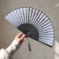 Classic folding fan with pink plum blossoms, black carved ribs and a grey tassel - Pink Plum & Butterfly Style (Smile Fan 29)