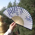 Classic blue and white porcelain pattern folding fan with dark blue silk tassel - Blue and White Floral Style (Smile Fan 28)