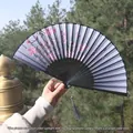 Traditional Chinese silk folding fan with pink cherry blossoms and a grey tassel detail - Purple Butterfly & Sakura Style (Smile Fan 23)