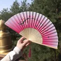 Pink gradient silk folding fan with cherry blossom pattern and matching silk tassel - Pink-Purple Gradient Cherry & Plum Style (A Smile Fan 17)