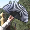 Blue-grey silk folding fan with floral and butterfly patterns and a grey tassel - Blue-Gray Butterfly Flower Style (Smiling Fan 10)