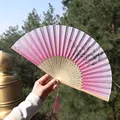 Pink gradient folding fan with plum blossom pattern and carved bamboo ribs with tassel - Pink Gradient Plum Blossom Style (Smile Fan 01)