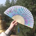 Classic blue folding fan with pink cherry blossoms, carved bamboo ribs and blue tassel - Peach Blossom Blue Style (Smile Fan 05)