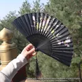 Classic black Chinese folding fan with pink floral pattern and long black tassel - Black with Pink & Yellow Floral Pattern (Fan 92)