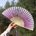 Classic purple folding fan with floral and butterfly prints and a silk tassel - Purple Butterfly & Flower Style (Smile Fan 83)