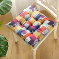 Colorful quilted chair cushion with grid pattern and ties on a white wooden chair - Patch (square) / 30x30 (anti-slip Cotton And Linen) 4-needle Kindergarten Use