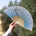 Blue and white gradient folding fan with plum blossom and butterfly patterns and blue tassel - Blue & White Gradient Plum & Butterfly Fan Style (Model 66)