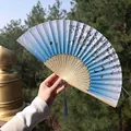 Blue and white gradient folding fan with butterfly prints and dark blue silk tassel - Blue & White Gradient Butterfly Floral Style (One Smile Fan 57)