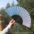 Classic Chinese folding fan with light blue silk, cherry blossom print and blue tassel - Light Blue Cherry Blossom Style (Smile Fan 56)