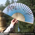 Classic Chinese folding fan with blue gradient, cherry blossoms, and blue tassel - Blue and White Gradient Butterfly Sakura Style (Smile Fan 54)