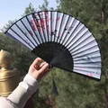 Classic folding fan with plum blossom and bird pattern and long black silk tassel - Black and White Plum Blossom & Magpie Design (Smile Fan 46)