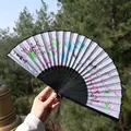 Classic folding silk fan with peach blossom ink art and grey hanging tassel accessory - Peach Blossom Ink Wash Style (Smile Fan 02)