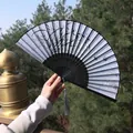 Elegant Chinese folding fan with ink orchid and butterfly pattern on white fabric - Black Ribs White Surface Ink Wash Moth Orchid Style (Smile Fan 12)