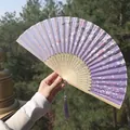 Purple folding fan with cherry blossom patterns, bamboo ribs, and elegant silk tassel - Purple Japanese Cherry Blossom Style (Smile Fan 15)