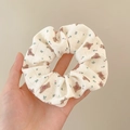Detailed view of cream ribbed scrunchie with pink floral and cute teddy bear prints - Printed Bear / Off White