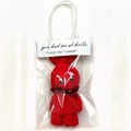 Red coral fleece towel folded into a bunny shape in a transparent gift bag with handle - Red + OPP Handbag