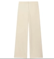 Detail of high-waisted wide-leg trousers in cream white with a smooth drape and clean cut - Apricot Pants