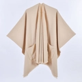 Beige knitted tassel shawl cape with front pockets and frayed hem for women - Pocket Style Beige
