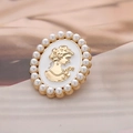 Elegant vintage cameo brooch with female profile relief and pearl border decoration - White Retro Portrait