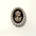 Elegant vintage cameo brooch with golden female profile relief and white pearl border - Black Retro Portrait