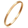 Minimalist geometric bangle in rose gold finish with polished square cube pattern - Rose Gold