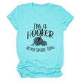 Flat lay of a teal crew neck T-shirt with hooker crochet pun print and soft texture - Deep Water Blue (Black Font)