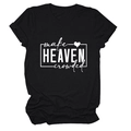 Close-up of white letter print and heart pattern on black cotton crewneck T-shirt - Black (White Font)