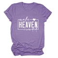 Close-up of the white 'make HEAVEN crowded' slogan print on a purple cotton blend T-shirt - Purple (White Font)