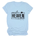 Close-up of make heaven crowded text and heart print on light blue cotton T-shirt - Light Blue (Black Font)