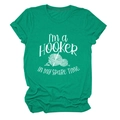 Detailed flat lay of bright green cotton T-shirt featuring a crochet humor graphic print - Dark Green (White Font)